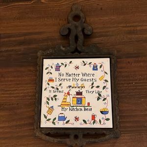 vintage cast iron with ceramic tile trivet